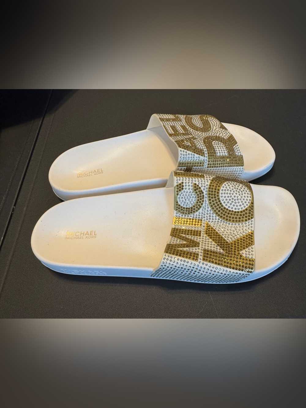Michael Kors White Slide Sandals with Gold Crystal Logo Accents